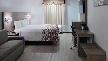 Premium bedding, desk, laptop workspace, free WiFi