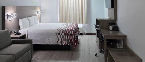 Premium bedding, desk, laptop workspace, free WiFi
