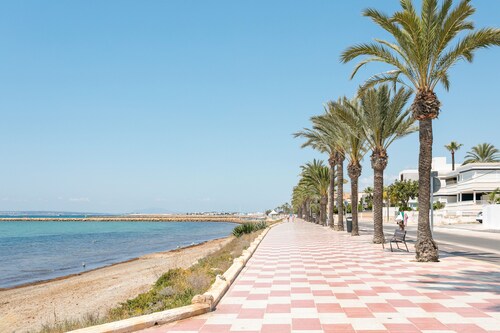Ferienwohnung 'Palmera V' mit privater Terrasse und privatem Garten