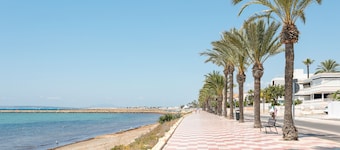 Ferienwohnung 'Palmera V' mit privater Terrasse und privatem Garten