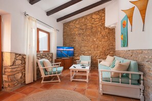 TV, fireplace - Country House 'Mosteiro - The Cozy Corner' with Mountain View, Private Pool and Private Terrace (Santa Margalida)