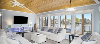 Luxury 3 bedroom waterfront home with indoor hot tub, sauna, paddle boat & kayak