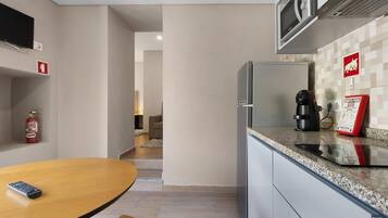Fridge, microwave, stovetop, coffee/tea maker