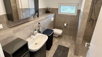 Hair dryer, towels, soap, toilet paper