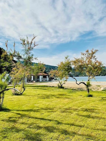 Beach. Seacret too by Villa Glyfos