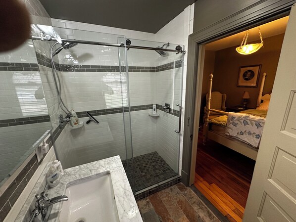 Shower, towels, soap, toilet paper