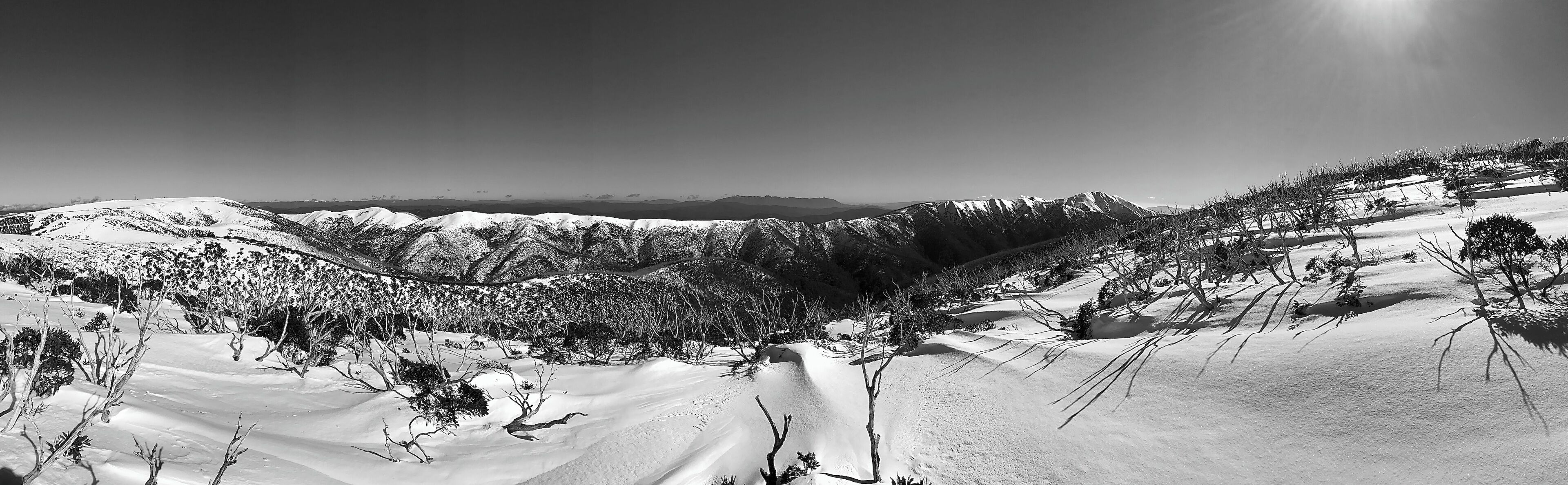 Winters day at Mt Hotham with Mt Feathertop & Mt Buffalo in background