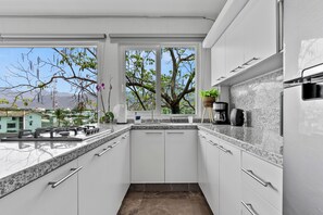 Fridge, microwave, coffee/tea maker, toaster - Cozy 2BR in Versalles – Walk to Beach & Dining (Puerto Vallarta)