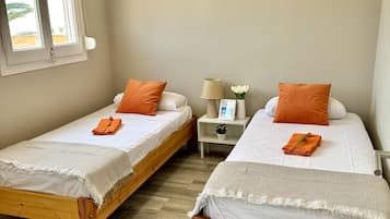 4 dormitorios, tabla de planchar con plancha, Internet y ropa de cama