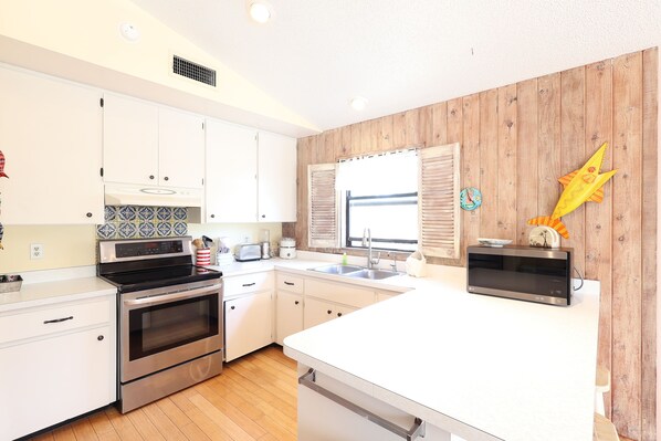 Microwave, dishwasher, coffee/tea maker, toaster