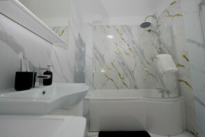 Hair dryer, towels, soap, toilet paper