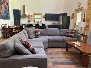 Smart TV, fireplace, table football, books