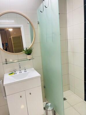 Shower, hair dryer, towels, soap