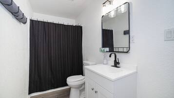 Hair dryer, towels, soap, shampoo