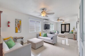 TV, fireplace - Hacienda M&B · Perfect for Groups, with Pool and Spacious Patio (Vega Baja)