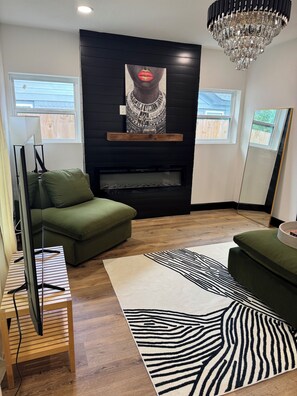 Smart TV, fireplace, books