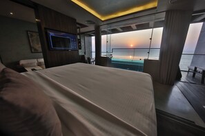 Suite, Balcony, Ocean View | Desk, blackout drapes, soundproofing, iron/ironing board