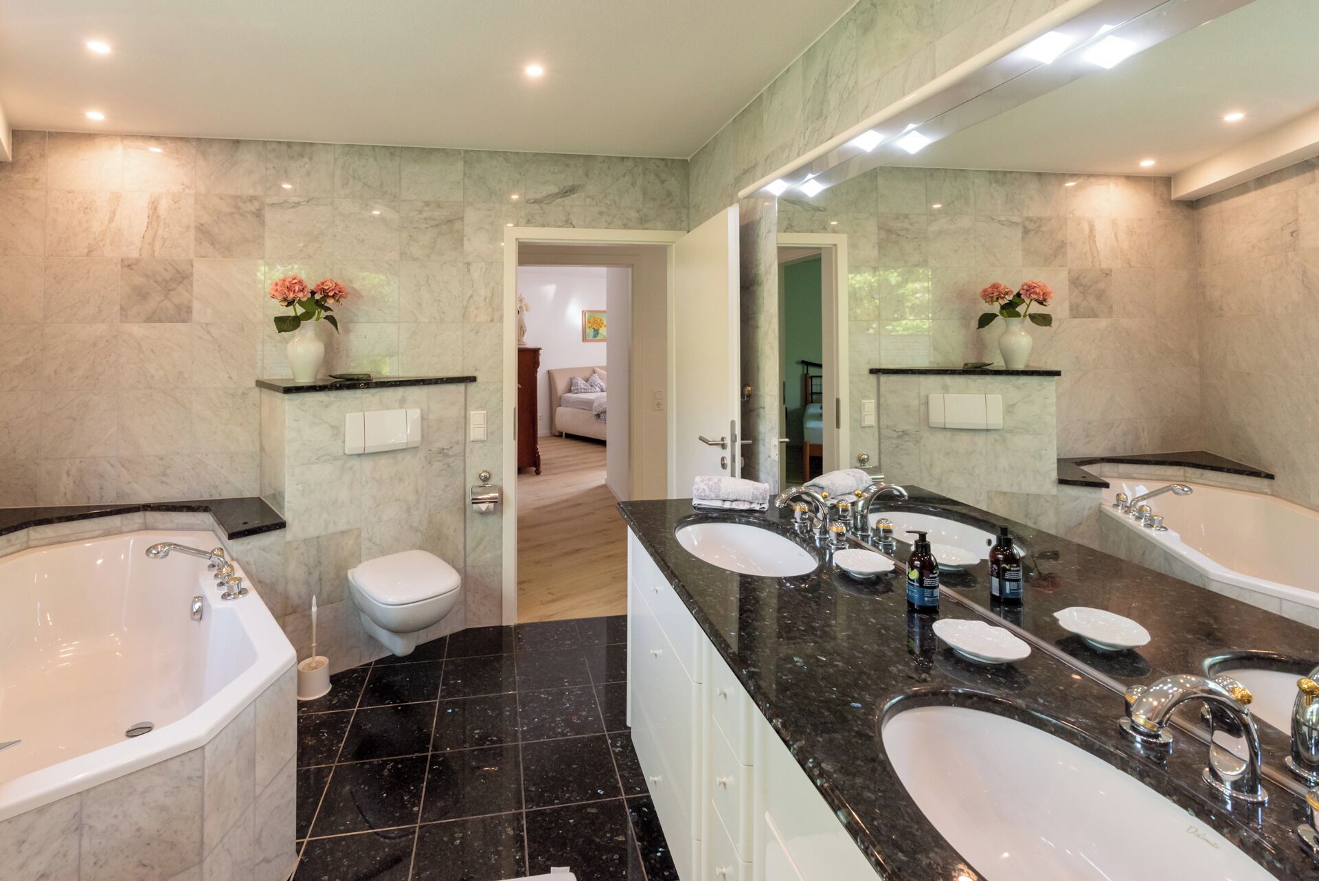 Shower, towels, soap, toilet paper