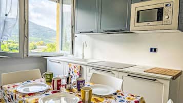 Fridge, microwave, cookware/dishes/utensils