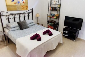 2 quartos, ferros/tábuas de passar roupa, Wi-Fi de cortesia