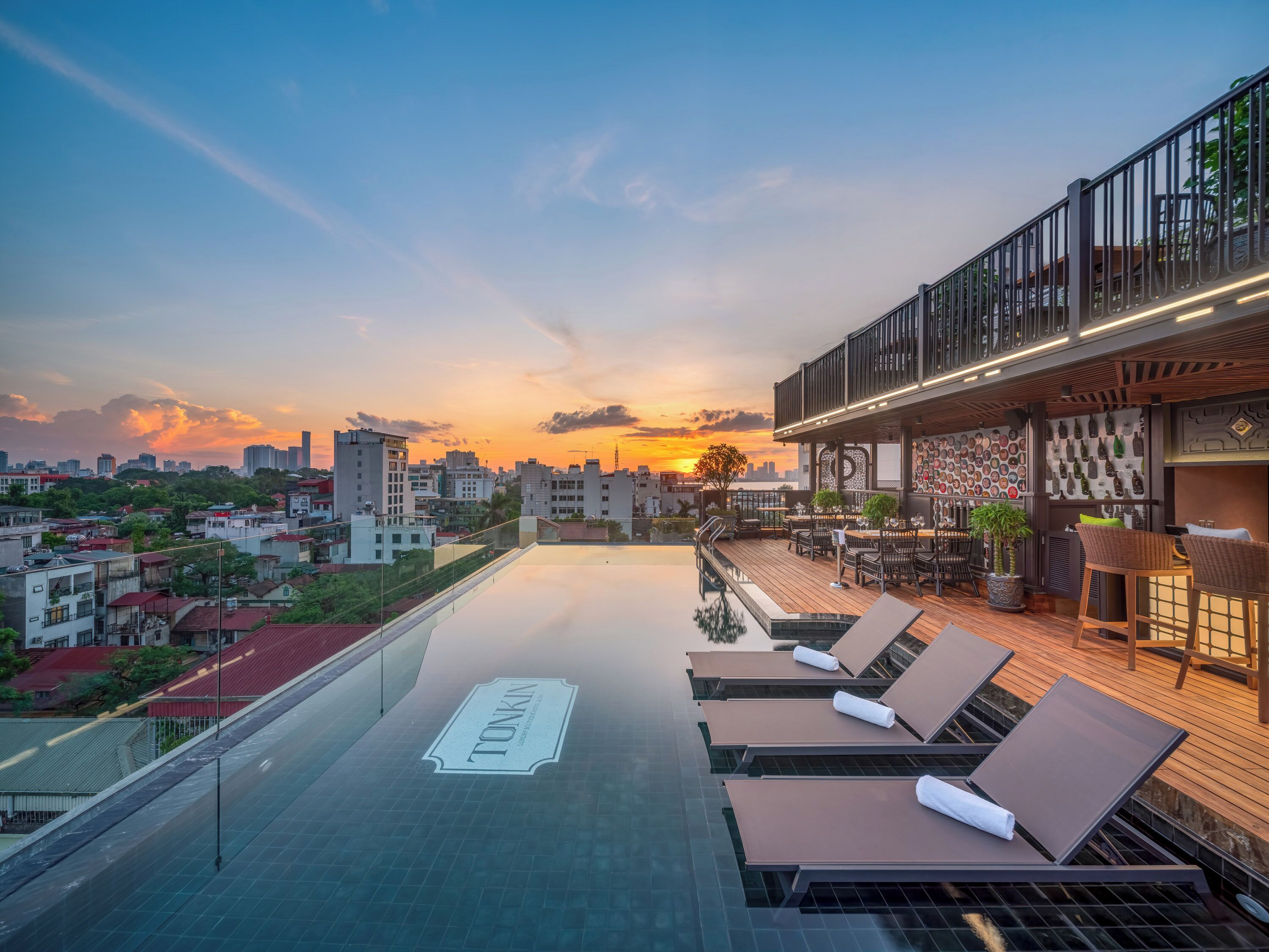 Outdoor pool, open 6:00 AM to 10:00 PM, pool umbrellas, sun loungers