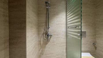 Combined shower/bathtub, hair dryer, bathrobes, slippers