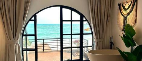 Deluxe Double Room, 1 King Bed, Sea View, Beachfront | Premium bedding, desk, laptop workspace, free WiFi