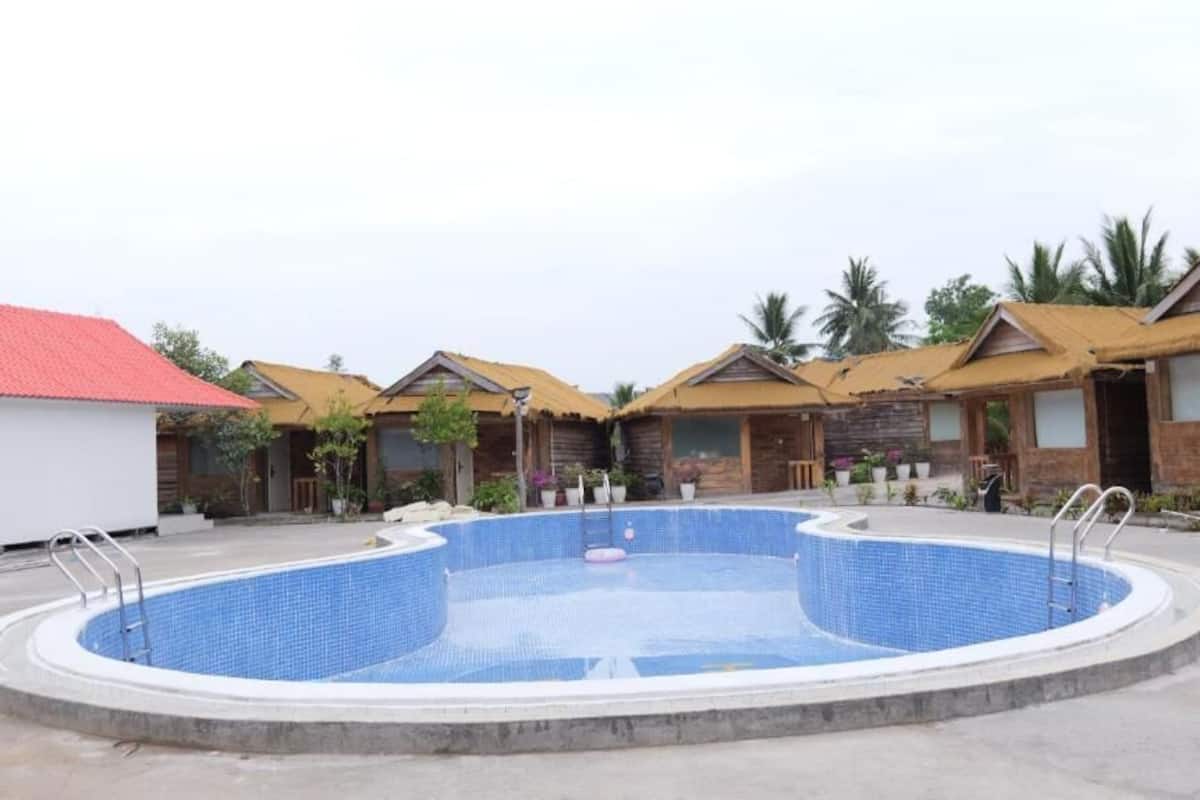 Habitación Deluxe con 2 camas individuales, vista al jardín | Wifi gratis y ropa de cama