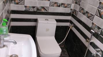 Shower, free toiletries, towels, soap