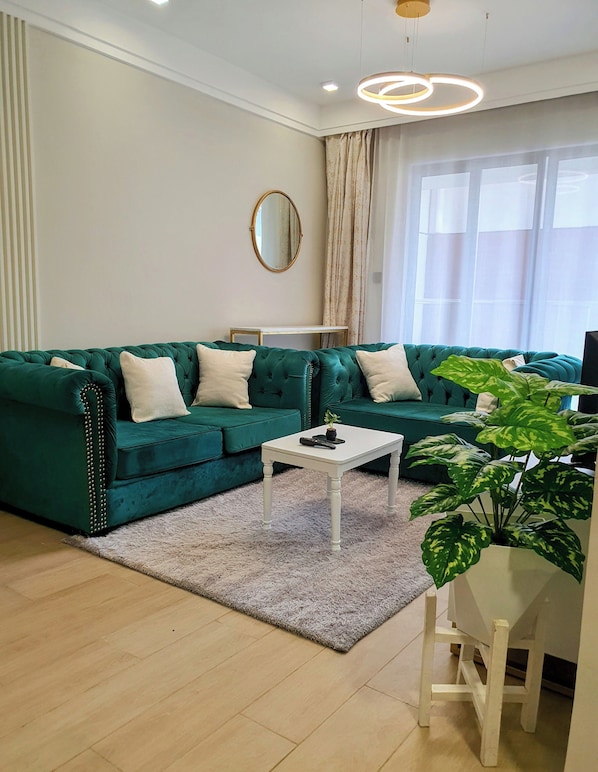 Appartement, 1 chambre, accessible aux personnes à mobilité réduite, fumeur | Salle de séjour | Livres