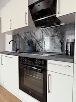 Full-size fridge, microwave, espresso maker, electric kettle