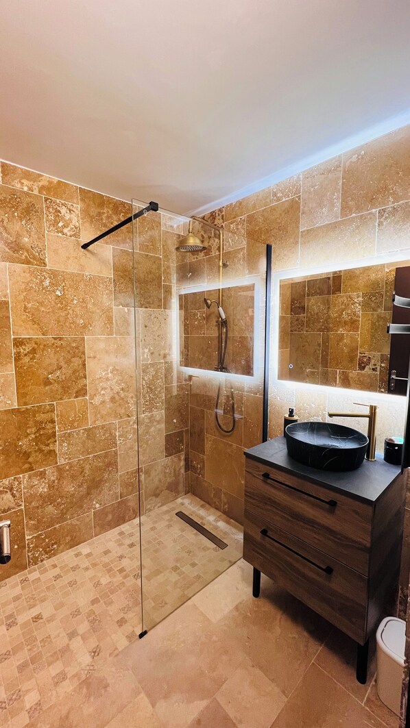Shower, hair dryer, towels, soap