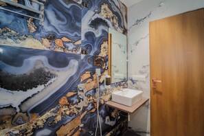 Superior Triple Room | Bathroom | Slippers, towels, soap, shampoo - Ascent Star Inn (Mumbai)