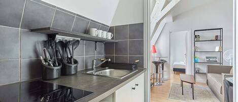 Fridge, microwave, stovetop, coffee/tea maker