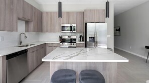 Fridge, dining tables - Landing | Modern 1BD in Fountain Heights (Birmingham)