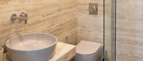 Shower, hair dryer, slippers, towels