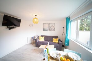 Premium Apartment, 1 Double Bed with Sofa bed, Sauna, Garden View | Living area - Kelys T2 Premium Jacuzzi (Boulogne-sur-Mer)