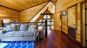 Smart TV, fireplace, table football, books
