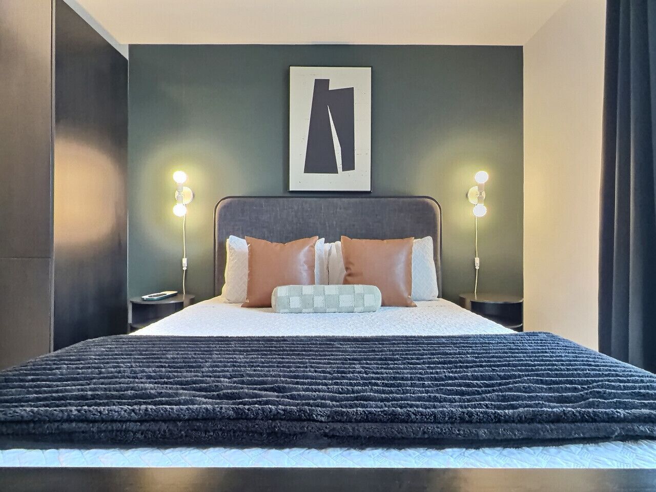 Clean, cozy, and perfectly made for relaxation in a furnished apartment.