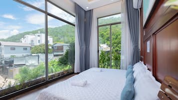 Villa Deluxe, 6 habitaciones, vistas a la ciudad, frente a la playa | Ropa de cama de alta calidad y colchones con acolchado adicional