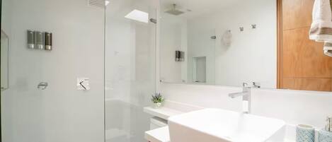 Shower, hair dryer, towels, soap