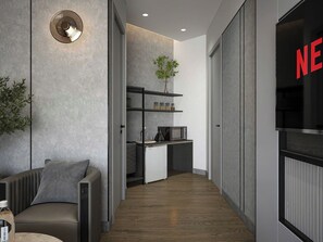 Departamento Deluxe, balcón, vista a la ciudad | Ropa de cama hipoalergénica, camas con efecto memoria y minibar