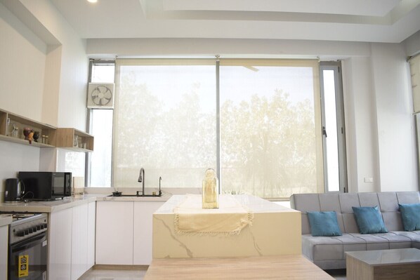 Microwave, stovetop, highchair, cookware/dishes/utensils