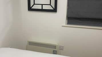 1 slaapkamer, een strijkplank/strijkijzer, wifi