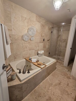 Shower, jetted bath, towels
