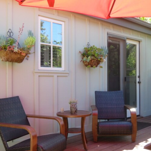 Charming quiet single story home amongst coast live oak trees in gated community