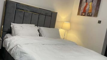 Basic Double Room, Balcony, City View | Iron/ironing board, WiFi (free)