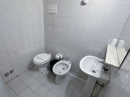 Basic Quadruple Room | Bathroom | Shower, towels, soap, shampoo