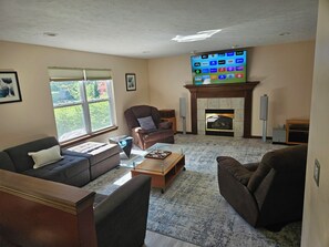 Smart TV, fireplace, table football, stereo