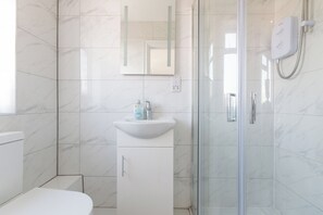 Hair dryer, towels, toilet paper